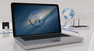 A laptop with a shopping cart icon on the screen